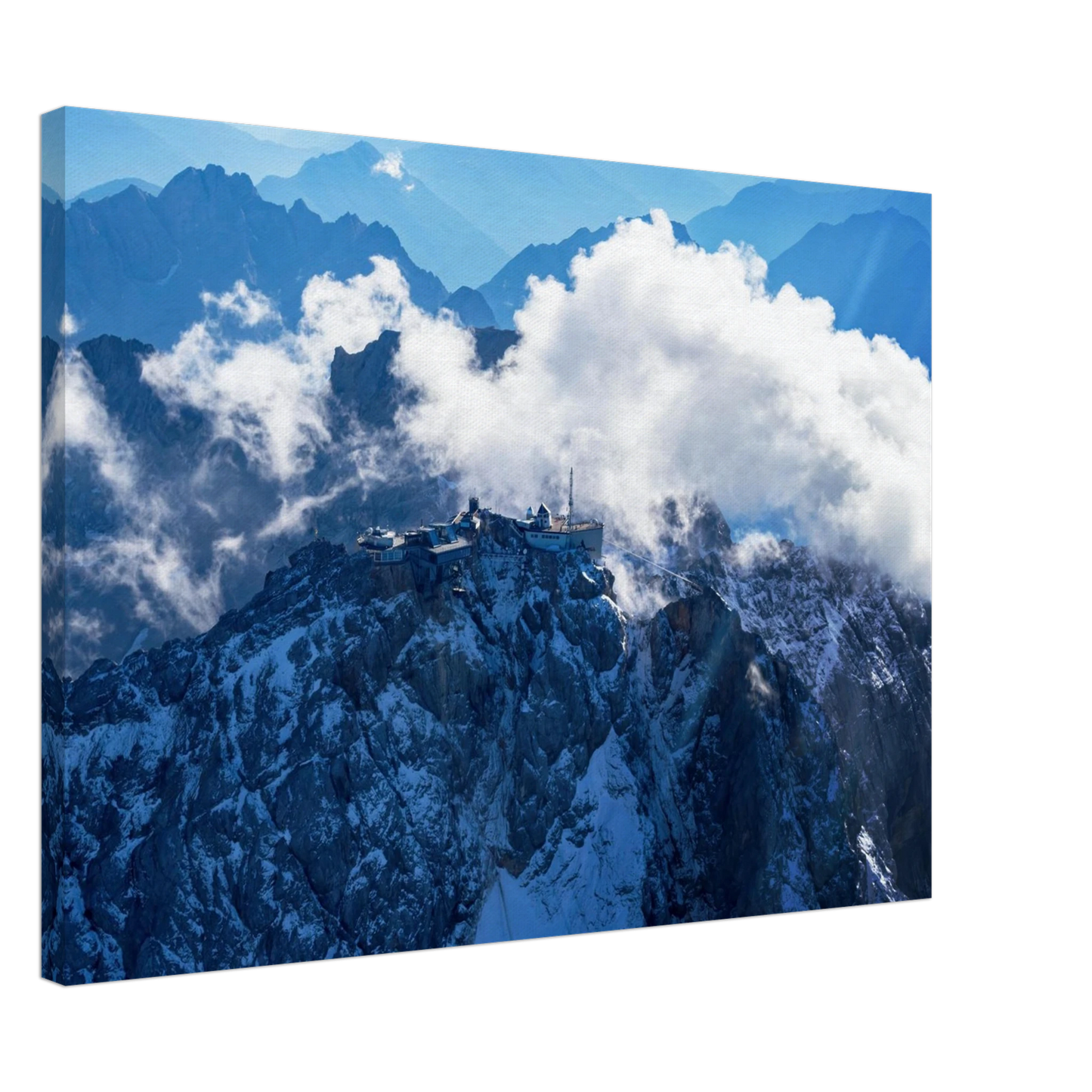 Wandbild alpine majesty gipfelstation im wolkenmeer mit blauen bergsilhouetten