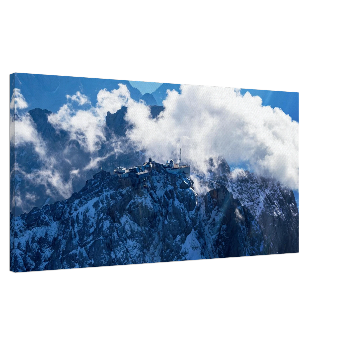 Wandbild alpine majesty gipfelstation im wolkenmeer mit blauen bergsilhouetten