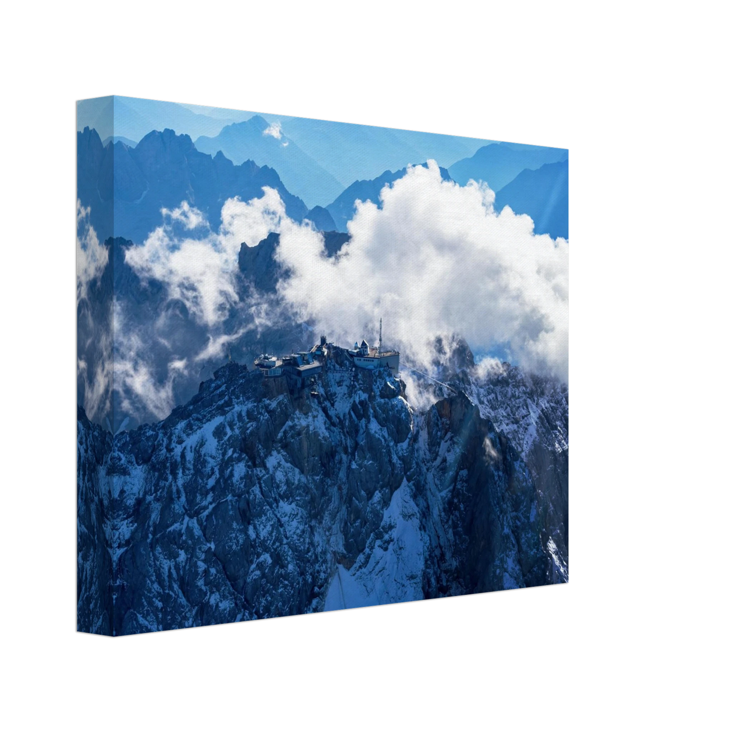 Wandbild alpine majesty gipfelstation im wolkenmeer mit blauen bergsilhouetten