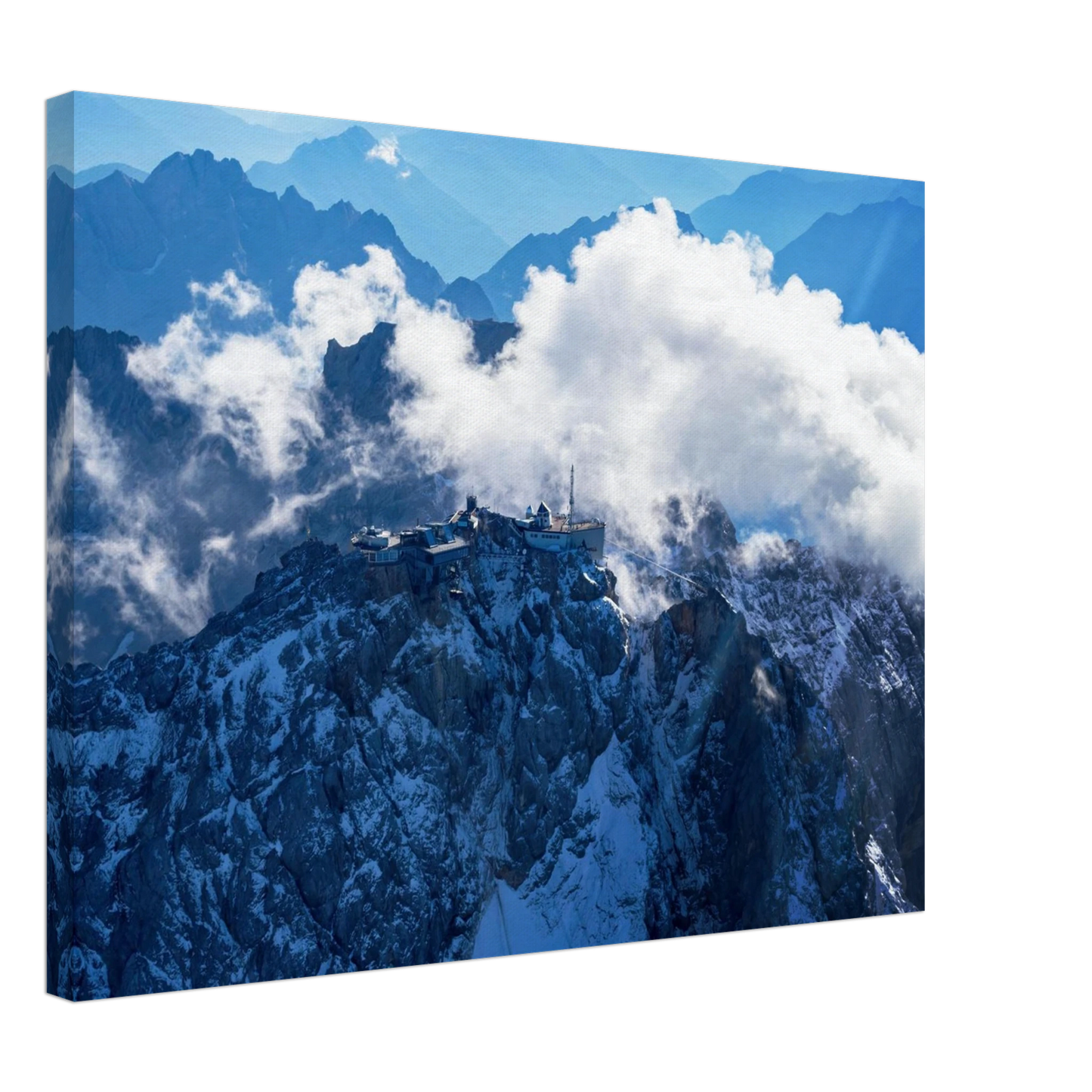 Wandbild alpine majesty gipfelstation im wolkenmeer mit blauen bergsilhouetten