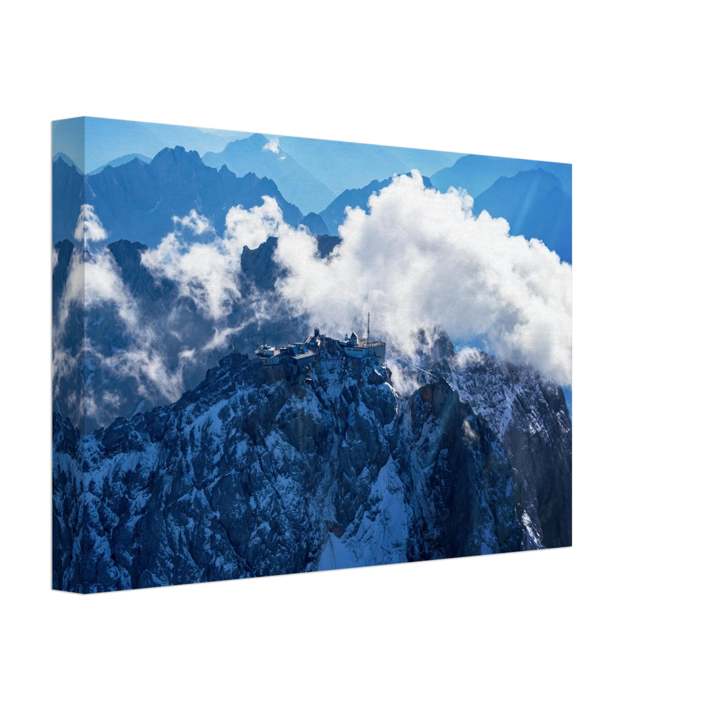 Wandbild alpine majesty gipfelstation im wolkenmeer mit blauen bergsilhouetten