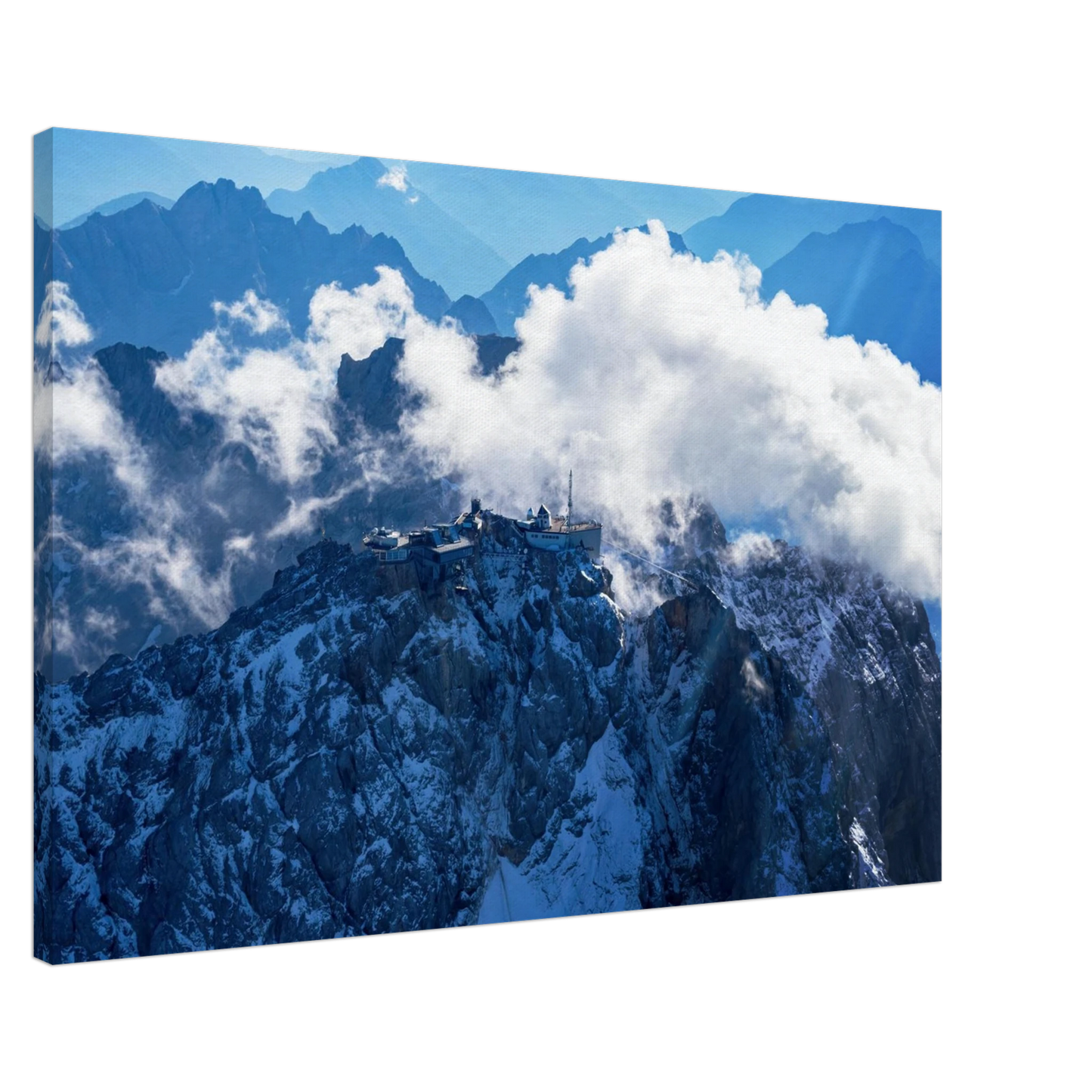 Wandbild alpine majesty gipfelstation im wolkenmeer mit blauen bergsilhouetten