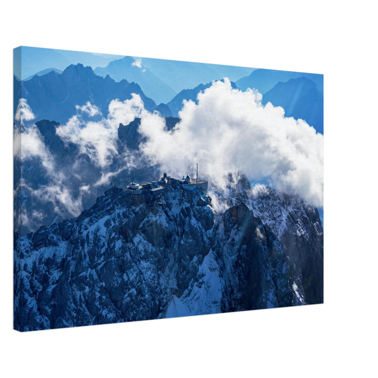 Wandbild alpine majesty gipfelstation im wolkenmeer mit blauen bergsilhouetten