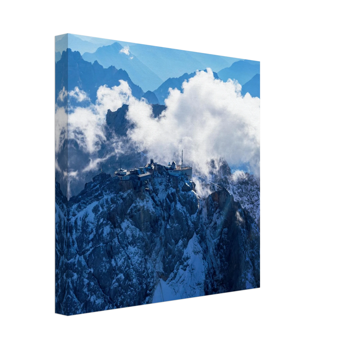 Wandbild alpine majesty gipfelstation im wolkenmeer mit blauen bergsilhouetten