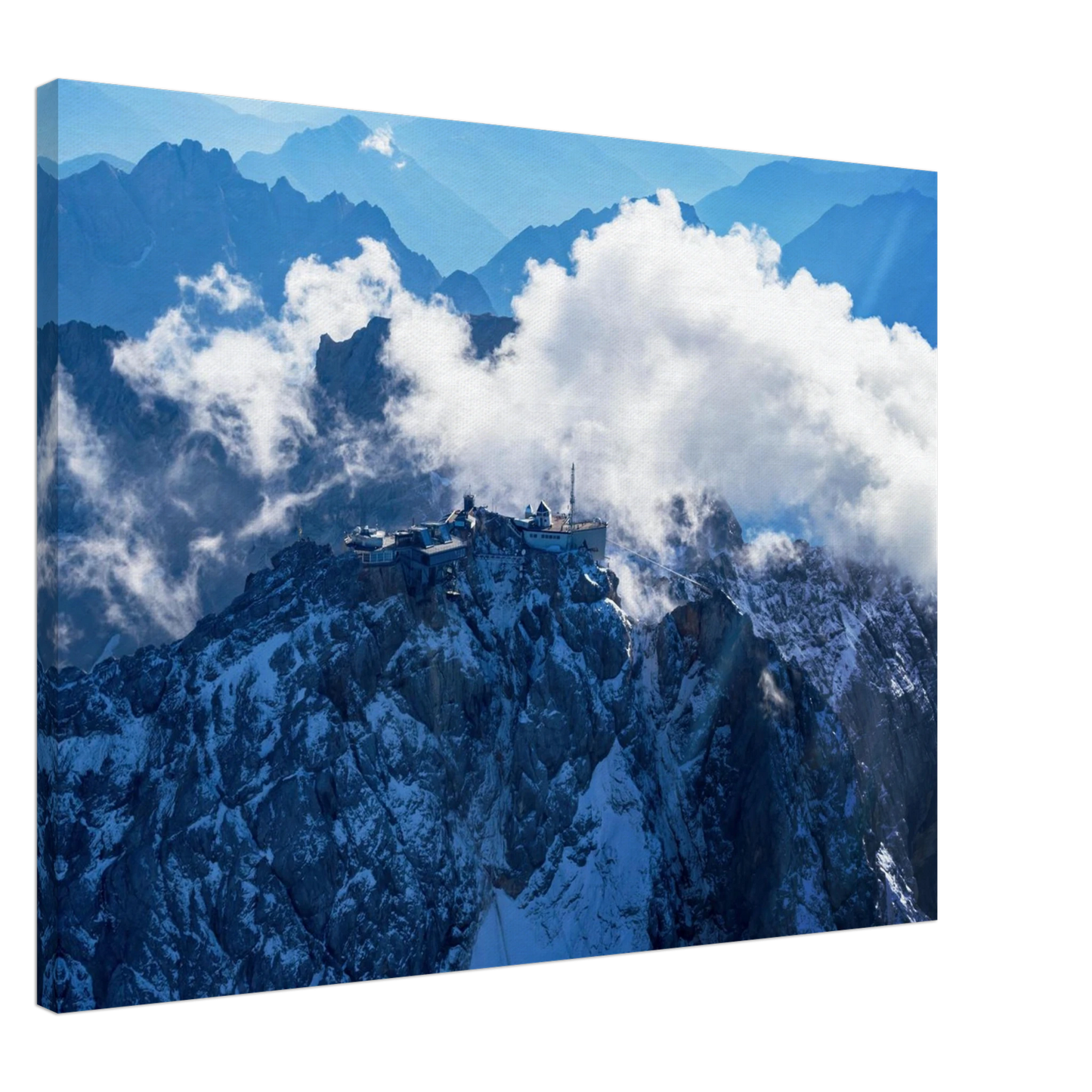 Wandbild alpine majesty gipfelstation im wolkenmeer mit blauen bergsilhouetten