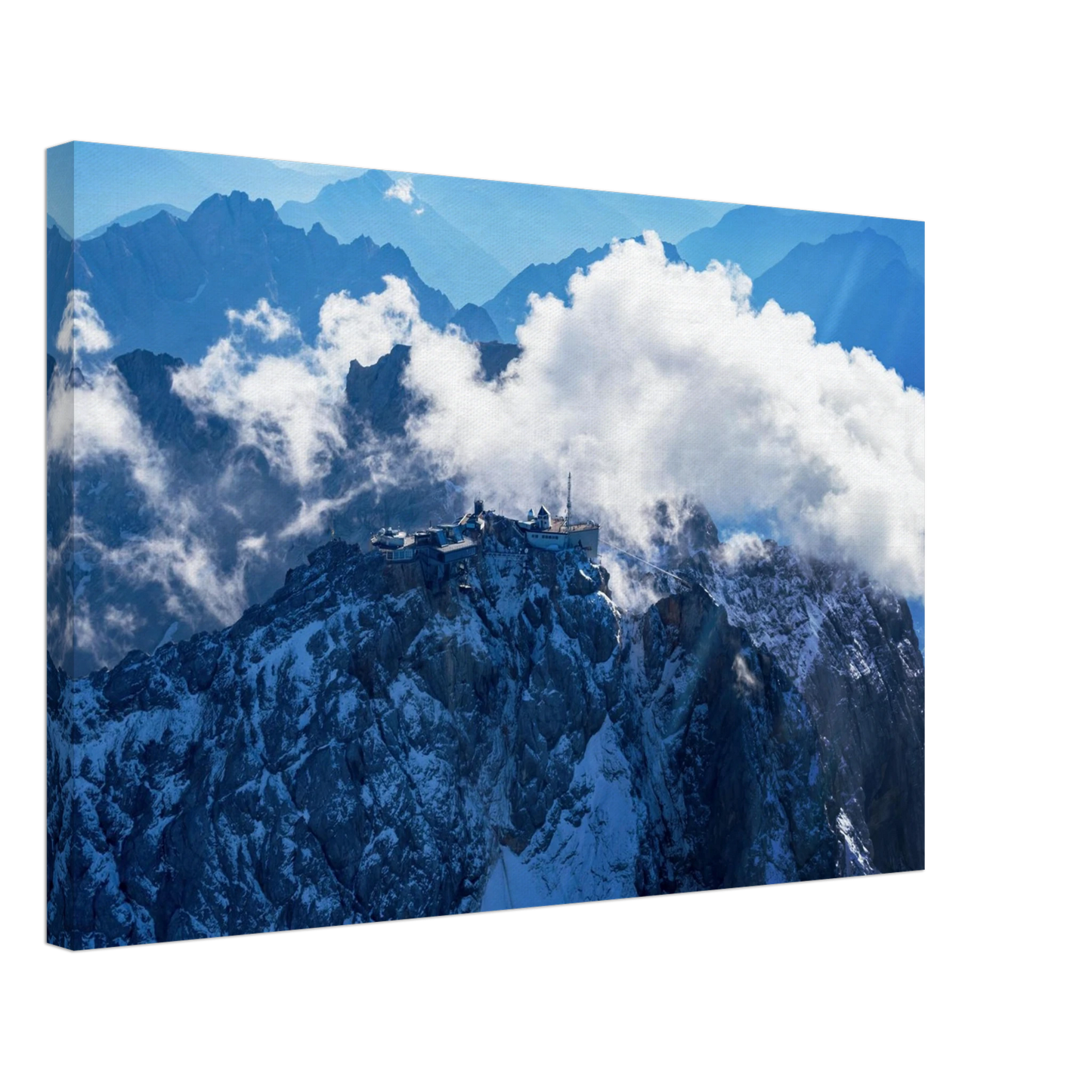 Wandbild alpine majesty gipfelstation im wolkenmeer mit blauen bergsilhouetten