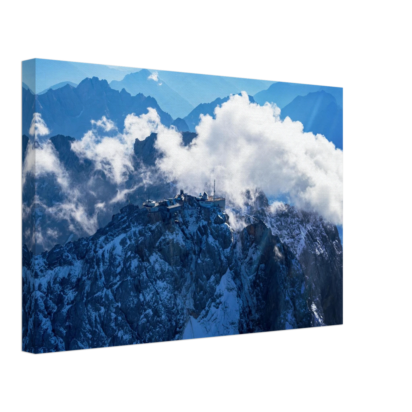 Wandbild alpine majesty gipfelstation im wolkenmeer mit blauen bergsilhouetten