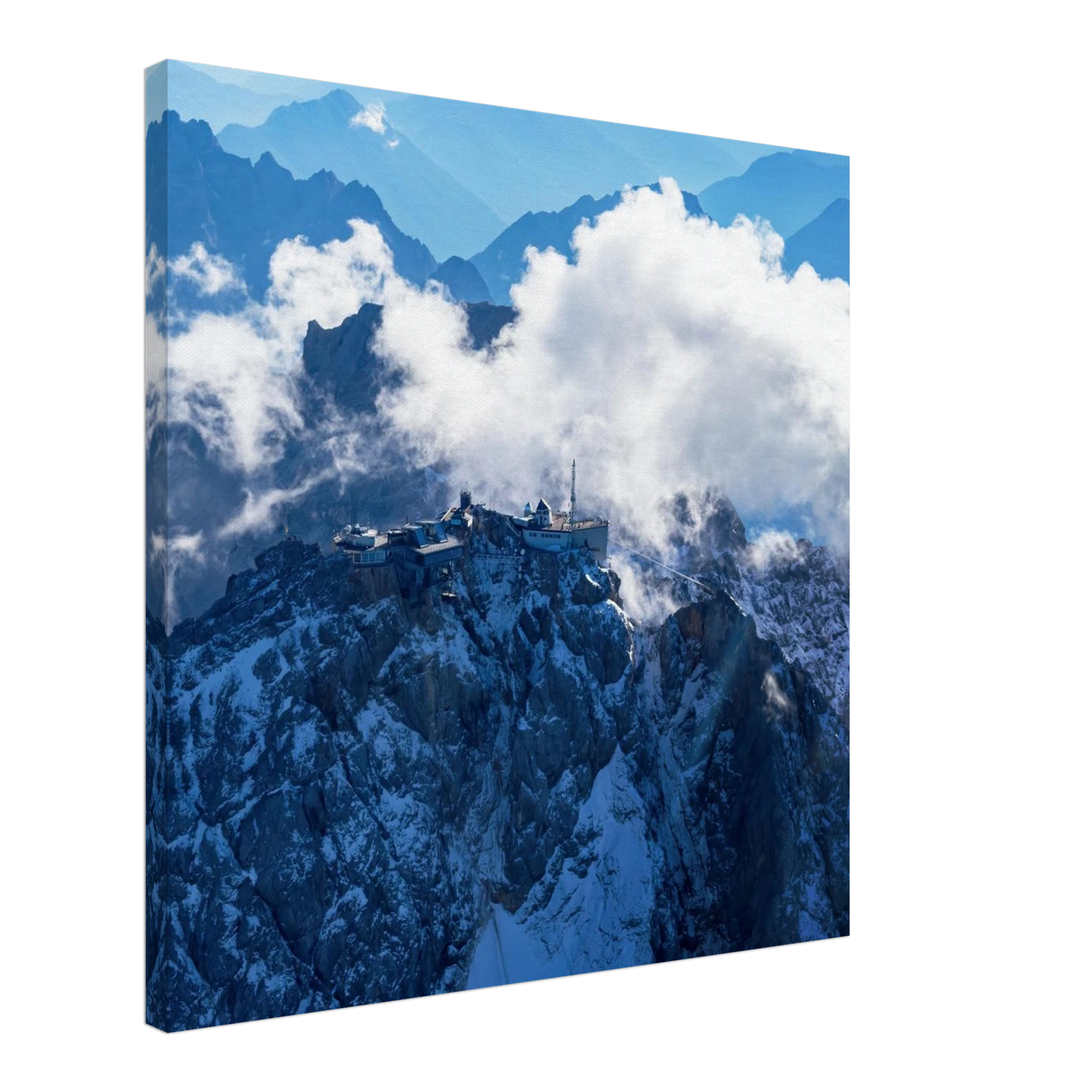 Wandbild alpine majesty gipfelstation im wolkenmeer mit blauen bergsilhouetten