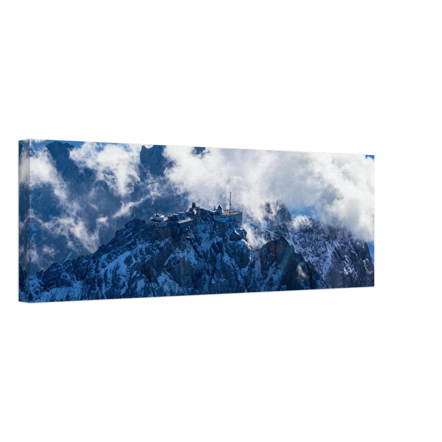 Wandbild alpine majesty gipfelstation im wolkenmeer mit blauen bergsilhouetten