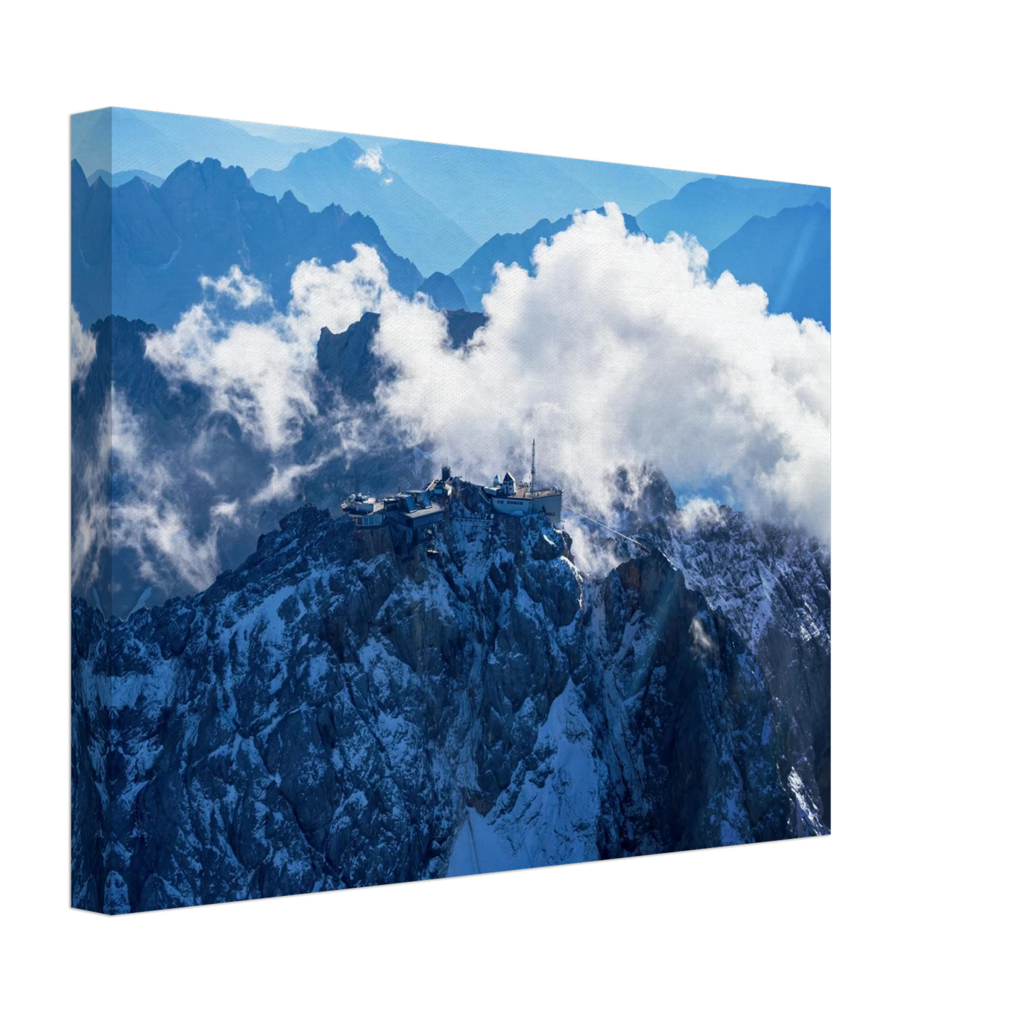 Wandbild alpine majesty gipfelstation im wolkenmeer mit blauen bergsilhouetten